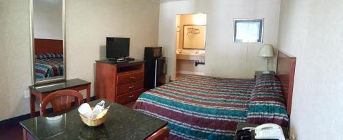 Pomona Hôtel | Atrium Inn & Suites