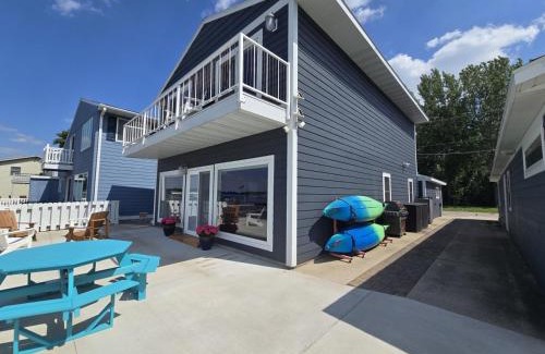 Orleans Maison | AWave From It All lakefront on Big Spirit Lake