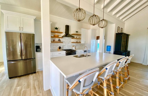North Palmetto Point Maison | AZURE: Banks Rd Luxury Beachfront Home with heated pool & backup generator.