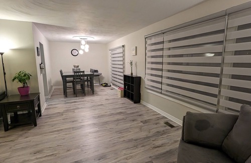 Kitchener Maison | Backyard Oasis with Pool, Hot tub & Fire table. 4 bedrooms, gym, & a yoga area!