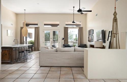 Desert View Village Maison | Barwick is a private oasis Practice on the putting green shoot pool and enjoy this city getaway.