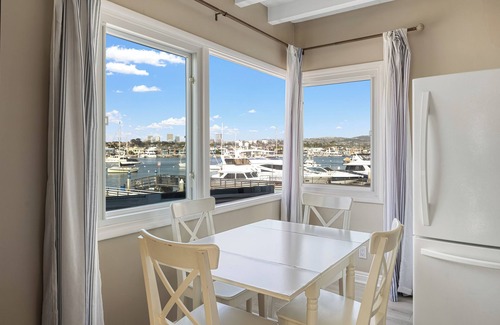 Balboa Peninsula Maison | Bayfront Condo w/ Dock Access + Patio | Walk to Beach, Surf & Newport Dining
