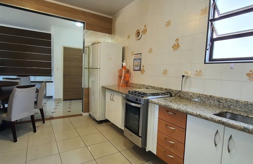 Canto do Forte Appartement | Beach apartment with side views of the sea and mountains
