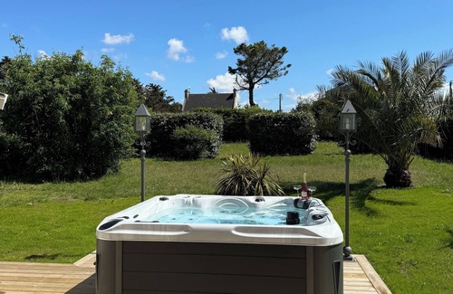 Guisseny Villa | Villa pieds dans l´eau avec Jacuzzi Sauna et cheminée "entre deux plages" -