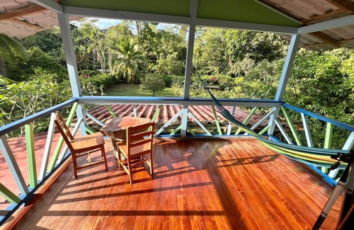Cahuita Maison | Villa sur la plage - À quelques pas de la plage avec jardin plein d'animaux sauvages!