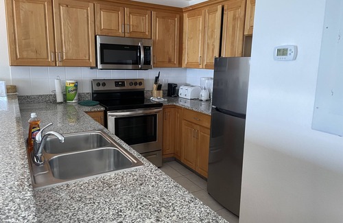 Colliers Bay Copropriété | Condo au 1er étage en bord de mer - Sortez de votre terrasse et allez au paradis!