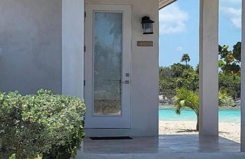 New Bight Maison | Beachfront Bungalow In Paradise: Papaya Villa