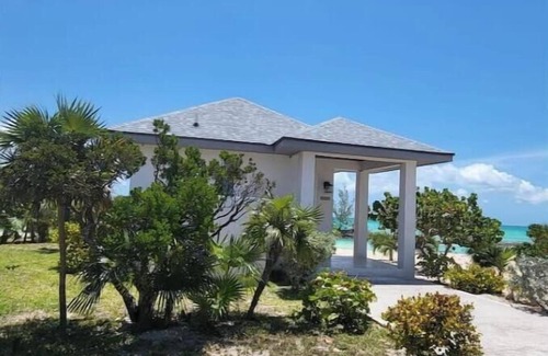 New Bight Maison | Beachfront Bungalow In Paradise: Papaya Villa