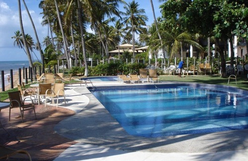 Praia do Forte Copropriété | Appartement en bord de mer avec 3 chambres et dans le village principal de Praia do Forte