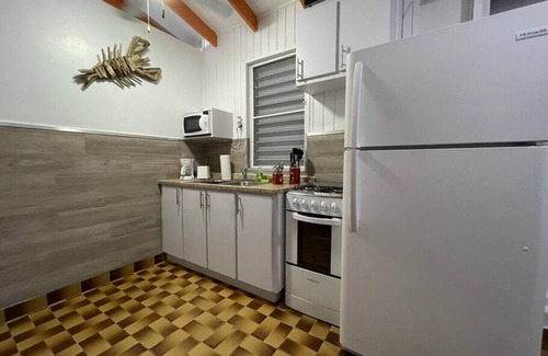 El Combate Cabine | Beachfront Rustic Cabin by Sunset Village - Orange
