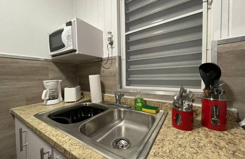El Combate Cabine | Beachfront Rustic Cabin by Sunset Village - Orange