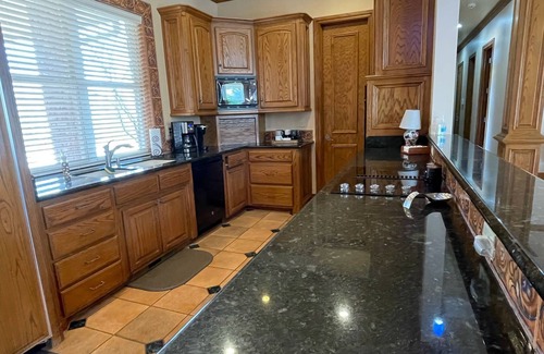 Edmond Maison | Beautiful 10 acre wooded estate with 4 bedrooms, 4 1/2 baths & private pool.