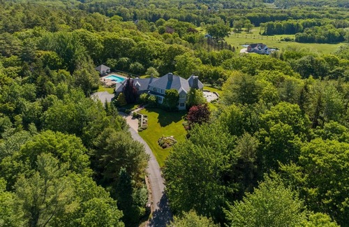 Yarmouth Maison | Spacious four bedroom home with distant water views and a heated pool!