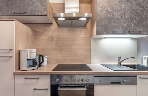 Arriach Villa | Agréable appartement dans une maison de vacances pour 9 personnes avec WIFI, TV et patio