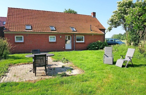 Bunde Maison | Agréable appartement dans une maison de vacances avec WIFI, TV, terrasse et animaux admis