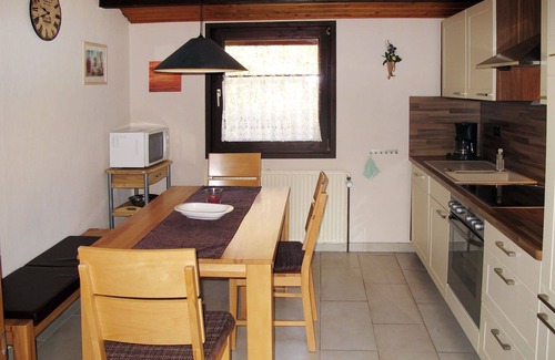 Machtlos Maison | Agréable appartement dans une maison de vacances avec piscine, TV, terrasse et animaux admis