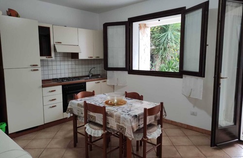 Porto Pino Appartement | BEAUTIFUL APARTMENT IN VILLA WITH SEA VIEW