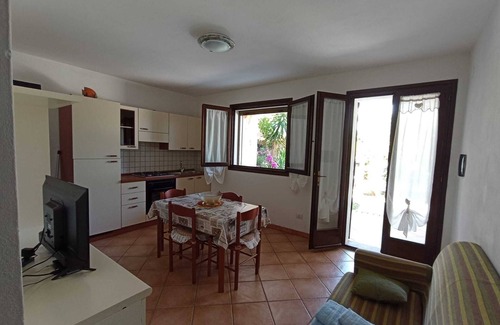 Porto Pino Appartement | BEAUTIFUL APARTMENT IN VILLA WITH SEA VIEW