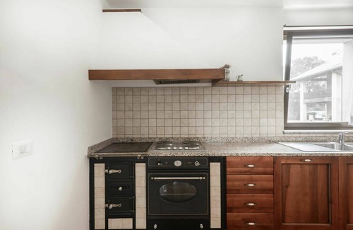 Povoletto Maison | Agréable appartement dans une maison de vacances avec climatisation, WIFI, piscine, TV, terrasse