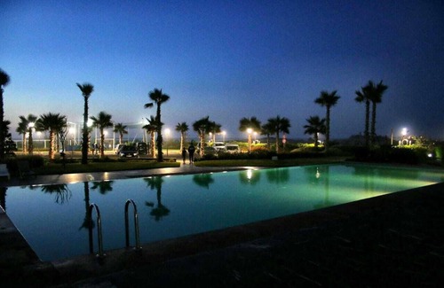Sidi Rahal Appartement | Bel appartement vue piscine e vue jardin acces directe à la plage Wifi illimité.