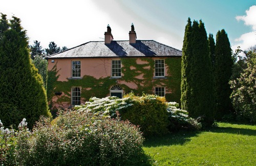 Whitegate Maison | Beau manoir de campagne situé dans des jardins luxuriants, vue sur le lac