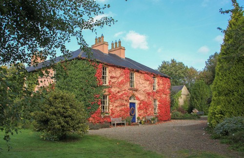 Whitegate Maison | Beau manoir de campagne situé dans des jardins luxuriants, vue sur le lac