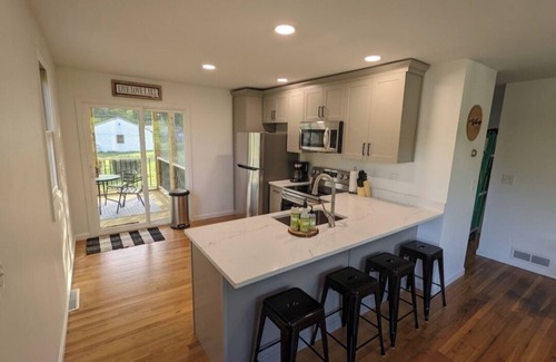 Raymond Maison | Beautiful home with 150ft sandy beach and private boat launch on Big Sebago!!!!!