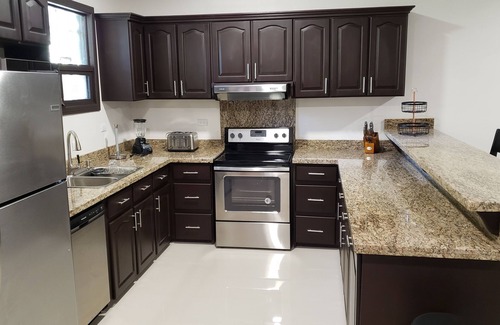 La Fortuna Copropriété | Beautiful New 2 Bedroom 3 Full Bath Condo with Attached Garage
