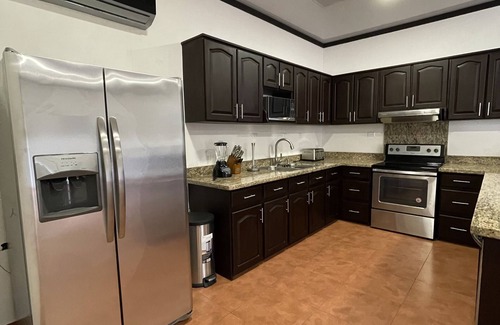 Chachagua Copropriété | Beautiful New 3 Bedroom 3 Bath Condo with Private Courtyard and Attached Garage