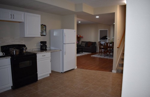 Aurora Appartement | Beautiful, new and spacious walk out basement