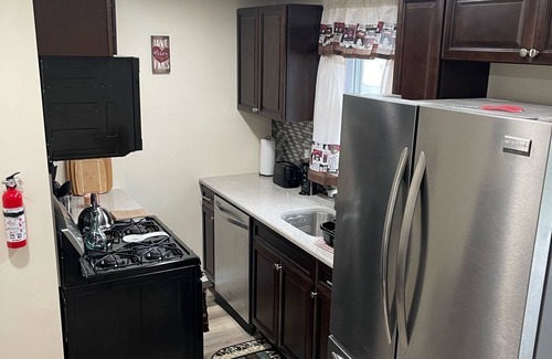Sharon Hill Maison | Beautiful newly renovated home near airport with fireplace & sunroom.