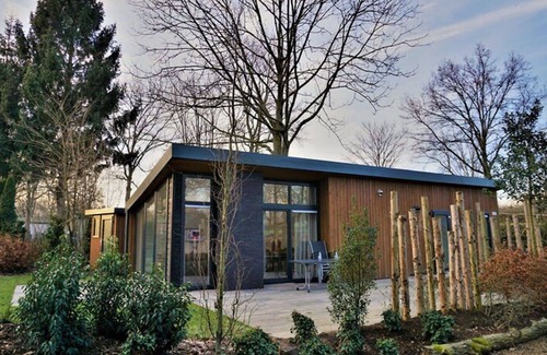Biddinghuizen Maison | Belle maison de vacances privée pour 4 personnes avec piscine, WIFI, TV et terrasse