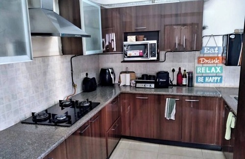 Noida Appartement | Beautiful Serviced apartment with garden and pool view