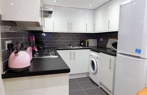 Peninsula Copropriété | BEL APPARTEMENT DE 2 CHAMBRES STYLE AU COEUR DE GREENWICH