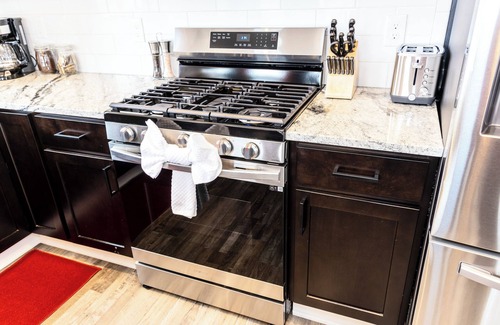 Weinland Park Maison | Beautiful Townhomes with Roof Terrace Hot Tubs and Game Room