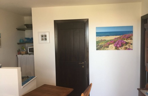 Porto Pino Appartement | Bel appartement de deux pièces dans une villa climatisée