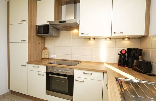 Glowe Maison | Beautiful vacation home with fireplace, garden and infrared sauna - Ferienhaus Wellenläufer
