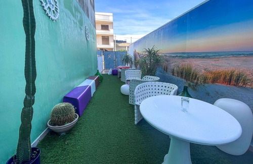 Aradeo Appartement | Beautiful vacation home with common courtyard and bar area.