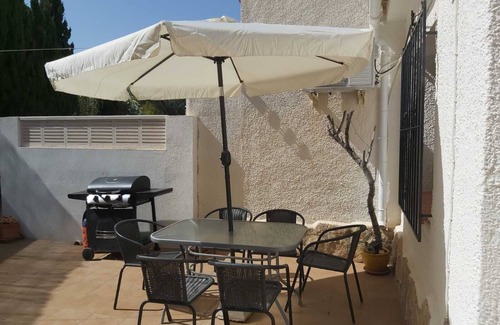 El Portet Villa | Belle villa avec vue sur la mer et une piscine partagée située dans les jardins méditerranéens