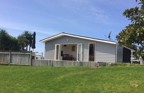 Pauanui Maison | Maison de plage au bord du parc magnifiquement rénovée