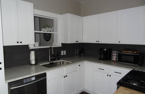 Enid Maison | Beautifully Updated Home With Workspace! K9 Friendly!