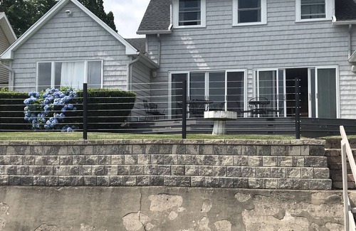 Sodus Point Maison | Beautifully updated home on the bay and golf course with dock and raised deck!