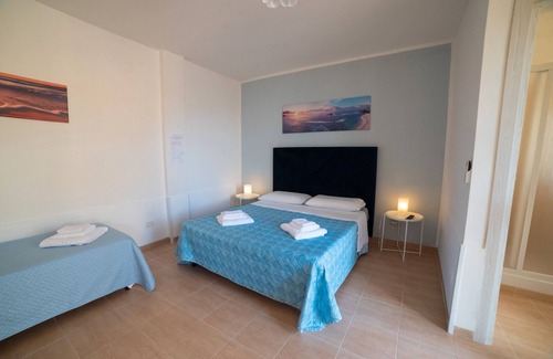 Agropoli Lit Et Petit-Déjeuner | Chambre d'hôtes "Camera Four Vista Cortile" avec terrasse partagée, Wi-Fi et climatisation