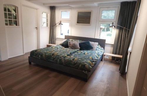 Ryptsjerk Appartement | Bed en stal 'Het Woudhuisje'