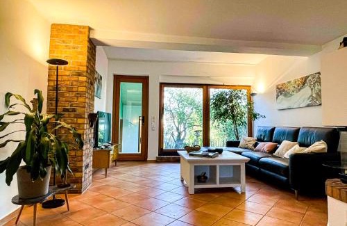 Roedermark Appartement | Behagliches Haus mit Kamin und romantischem Garten
