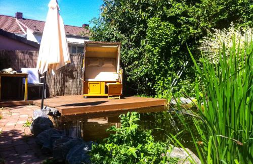 Roedermark Appartement | Behagliches Haus mit Kamin und romantischem Garten
