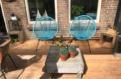 Anjum Maison | BelleMare Bungalow Lauwersmeer mit überdachte Veranda und eingezäuntem Garten