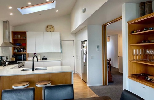 Bayswater Maison | Waterfront paradise with stunning views, spa pool, and paddle boarding.