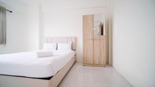 Surabaya Appartement | Best Choice 2BR at Puncak Dharmahusada Apartment Surabaya By Travelio