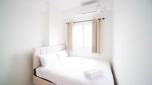 Surabaya Appartement | Best Choice 2BR at Puncak Dharmahusada Apartment Surabaya By Travelio